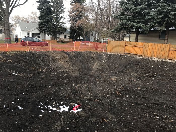 Track excavator beginning site excavation